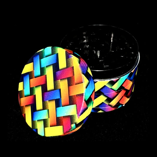 Patterned intertwined colored herb grinder
